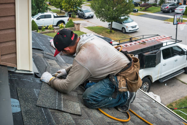 Professional Roofing technician working in Genoa, NY